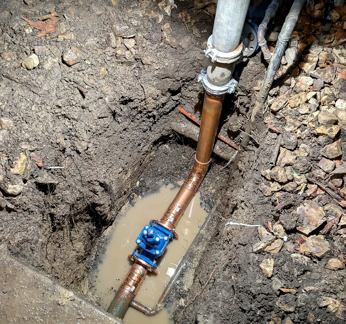 Fire service leak repair in Melbourne, a new copper riser and isolation valve fitted in the trench