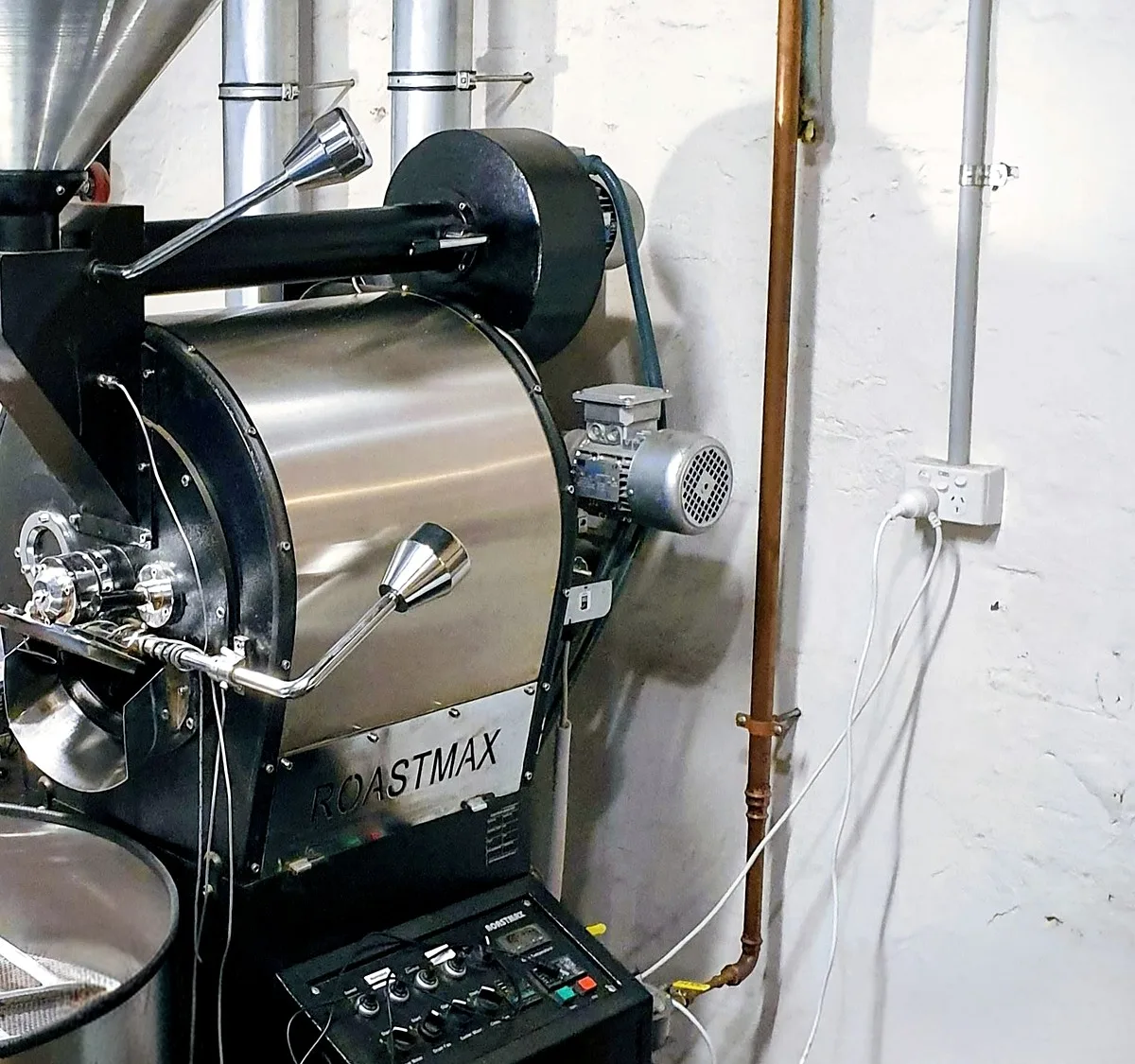 Commercial gasfitting in Melbourne, a copper gas line and valve installed to a coffee roaster